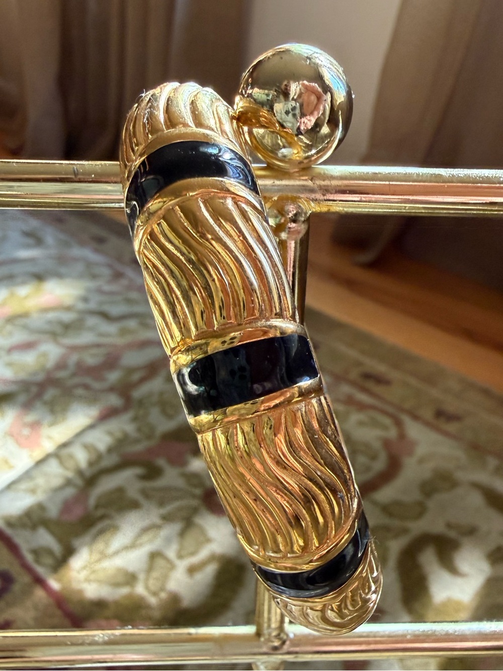 Vintage Monet Bangle Bracelet Gold Tone Hinged with Black Enamel accents